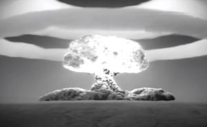 A nuclear explosion showing mushroom cloud in monochrome