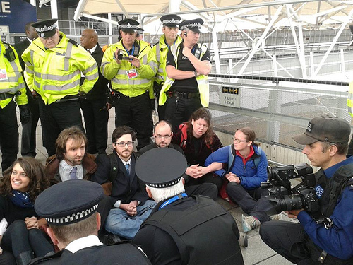 Christian protesters blocked the main visitors entrance for an hour on the opening day of the arms fair - one of many effective direct actions during the week.